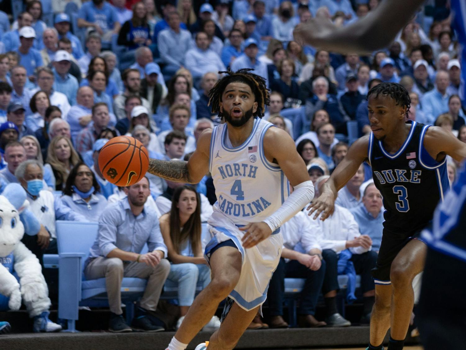 UNC junior guard RJ Davis (4) dribbles the ball during the men's basketball game against Duke on Saturday, March 4, 2023.