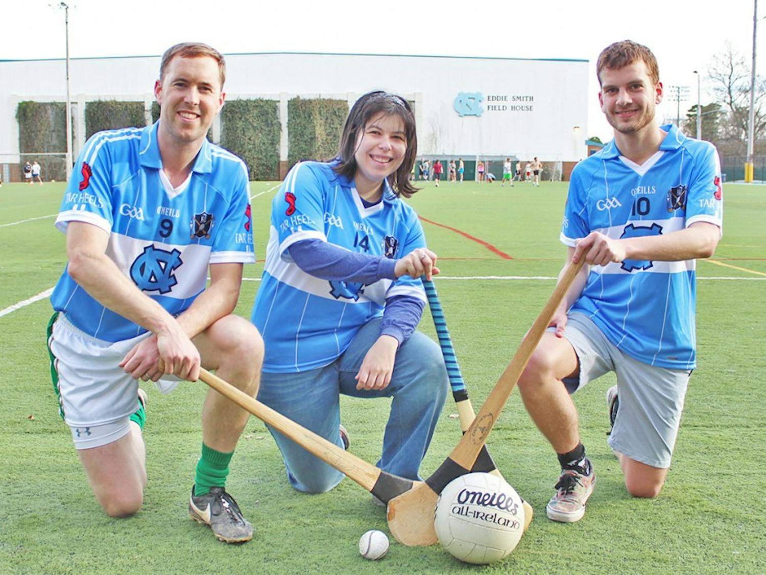 Sarah Holstein, Dara Ó hAnnaidh and Samuel Haddad practice Gaelic Football and Hurling Monday as part of The Irish Sports and Culture Club. 