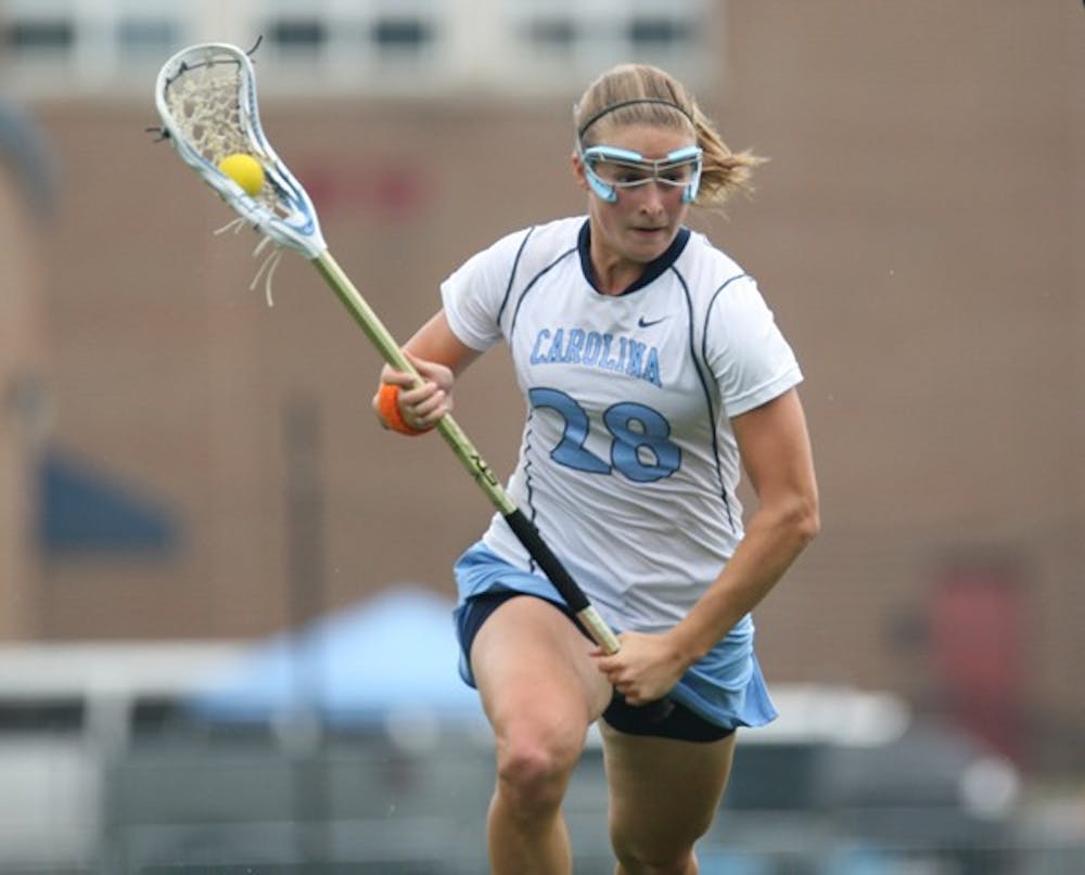 Defender Katy Fitzgerald sprints down the field in a spring 2010 game. DTH/Stephen Mitchell