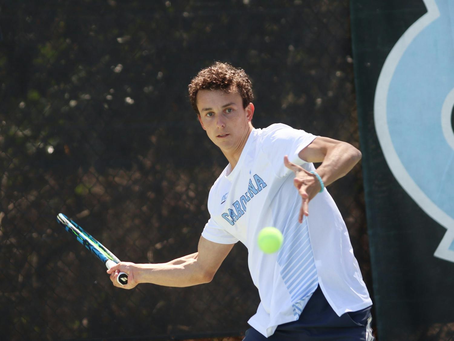Sophomore Peter Murphy goes to return a volley during his singles match against Notre Dame. UNC won 4-0 against Notre Dame at home on Sunday, March 27, 2022.