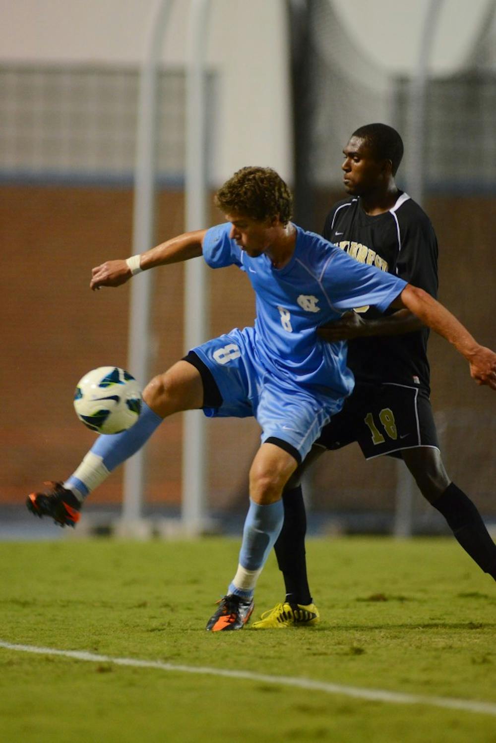 UNC Senior Martin Murphy (8) traps the ball along the sideline against Wake Forest in Carolina's 0-0 draw on September 14th, 2012 at Fetzer Field in Chapel Hill, North Carolina.