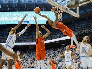 Virginia Tech sophomore forward David N'Guessan (1) makes a flagrant dunk during UNC basketball's home game against Virginia Tech on Monday, Jan. 24, 2022, at the Dean Smith Center. UNC won 78-68.
