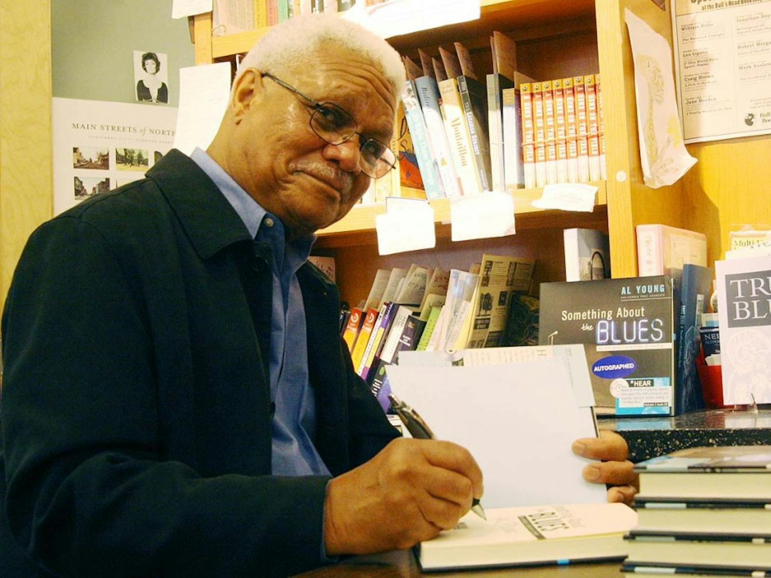 Al Young signs books in the Bull's Head Bookshop