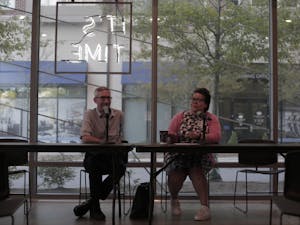 Damon Seils and Allie Thomas lead a panel at the Current Art Gallery on Tuesday, April 16, 2019.