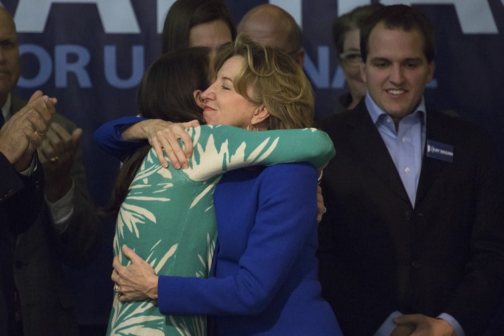 U.S. Sen. Kay Hagan (D-NC) embraces her daughter, Carrie Hagan Stewart, as she thanks her supporters at the Greensboro Coliseum late Tuesday evening.