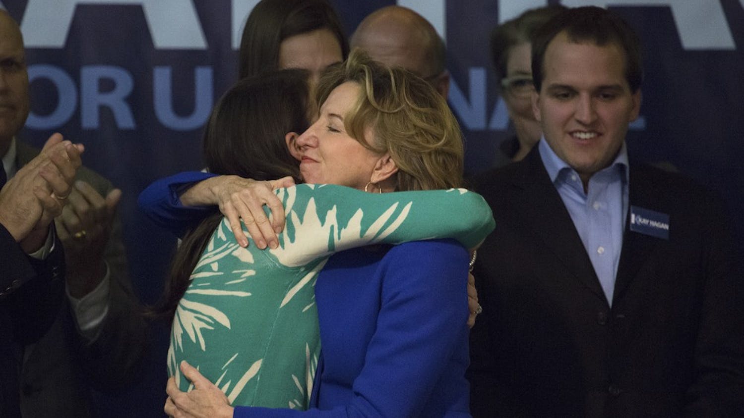 U.S. Sen. Kay Hagan (D-NC) embraces her daughter, Carrie Hagan Stewart, as she thanks her supporters at the Greensboro Coliseum late Tuesday evening.