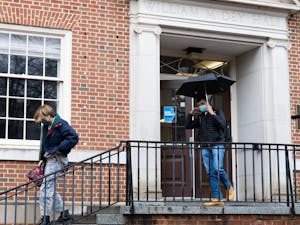 Students exit their in-person classes on UNC's campus on Monday, Feb. 7, 2022.