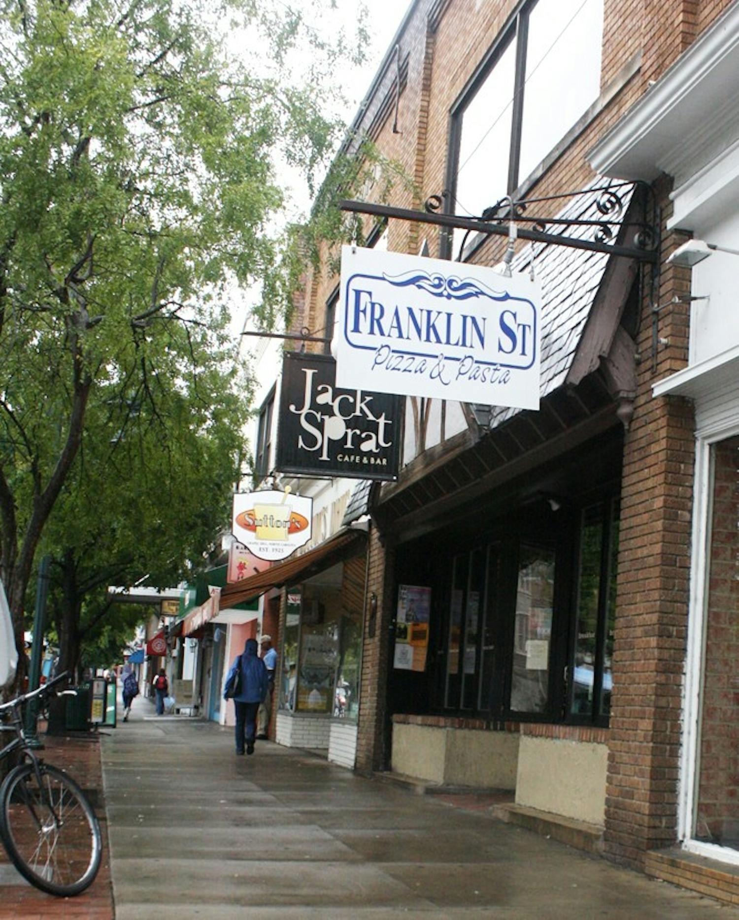 Franklin Street businesses, despite the economic downturn and high rent costs, are still maintaining growth and bringing in customers.