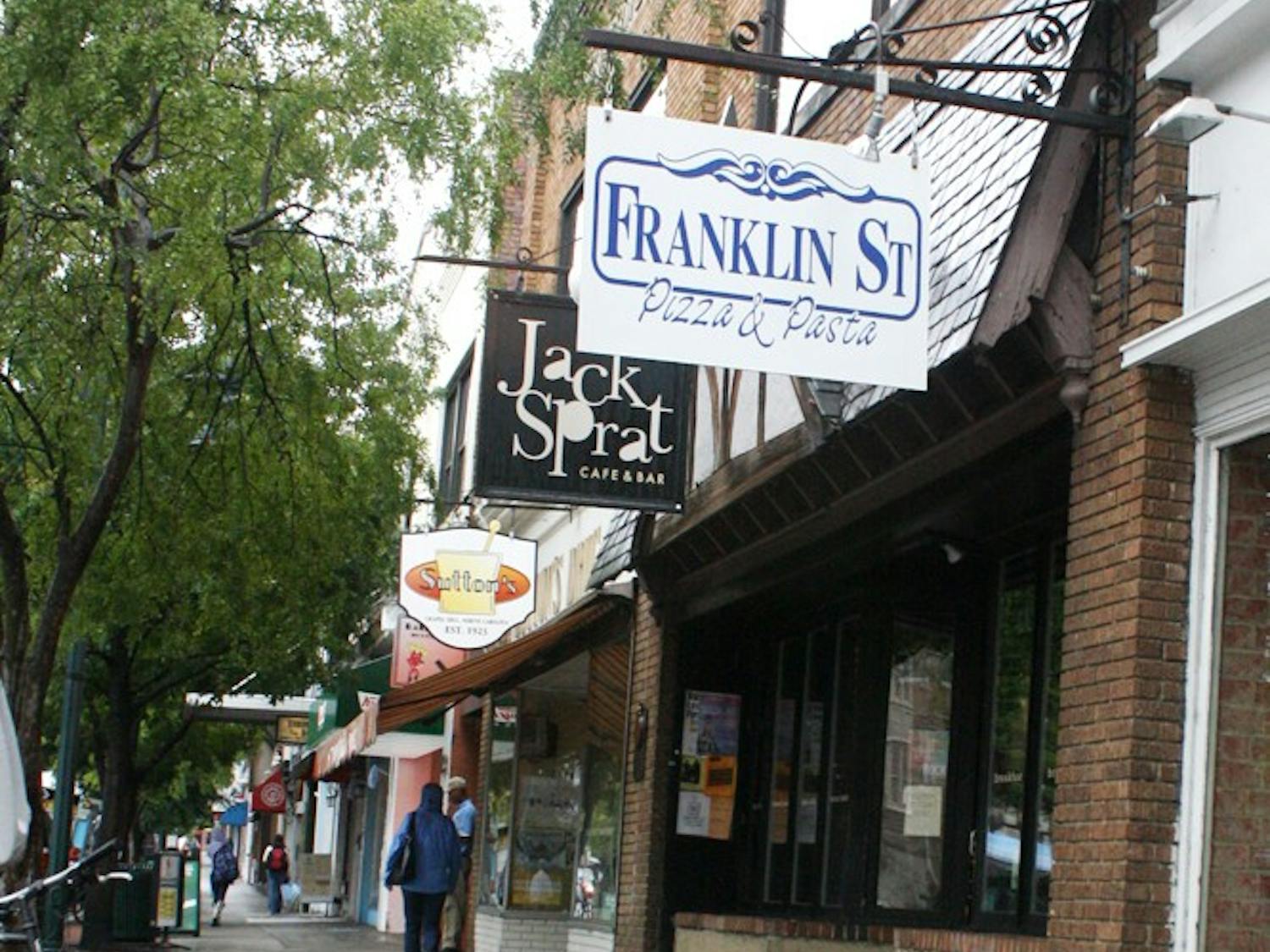 Franklin Street businesses, despite the economic downturn and high rent costs, are still maintaining growth and bringing in customers.