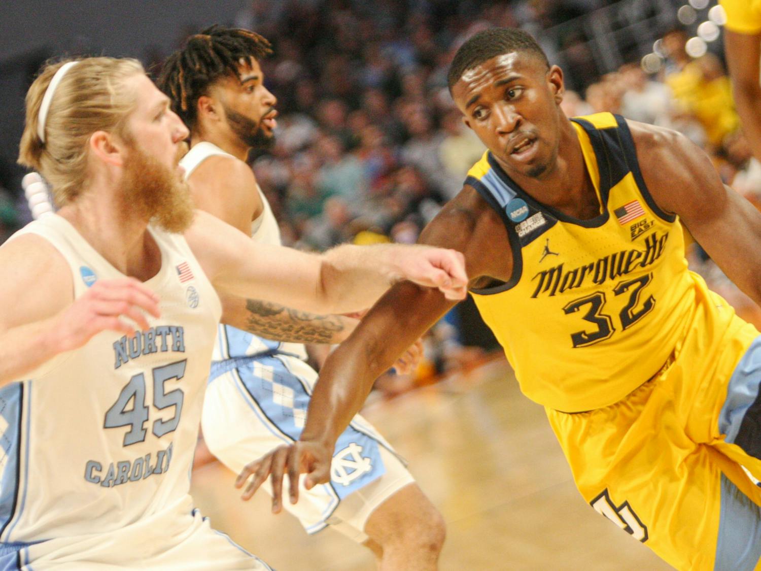 Marquette graduate guard Darryl Morsell (32) drives into the paint during the first round of the NCAA tournament against UNC on Thursday, March 17, 2022, in Fort Worth, Texas. UNC won 95-63.