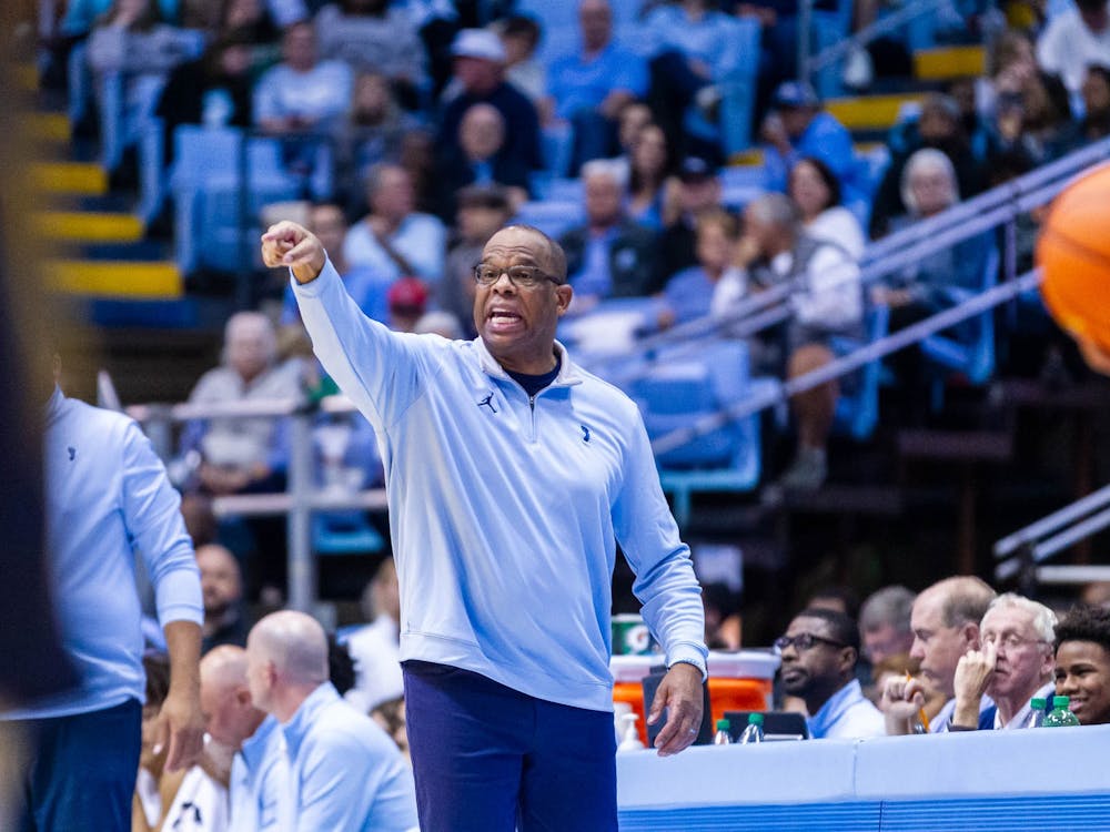 UNC men's basketball head coach Hubert Davis directs his team from the sidelines during the exhibition game against JCSU at the Dean Smith Center on Friday, Oct. 28, 2022. UNC beat JCSU 101-40.