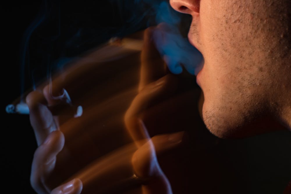 <p>DTH Photo Illustration. A UNC student smokes CBD on Monday, Feb. 6, 2023. CBD products, which are currently legal in North Carolina, are made from marijuana but lack the psychoactive effects of THC.</p>