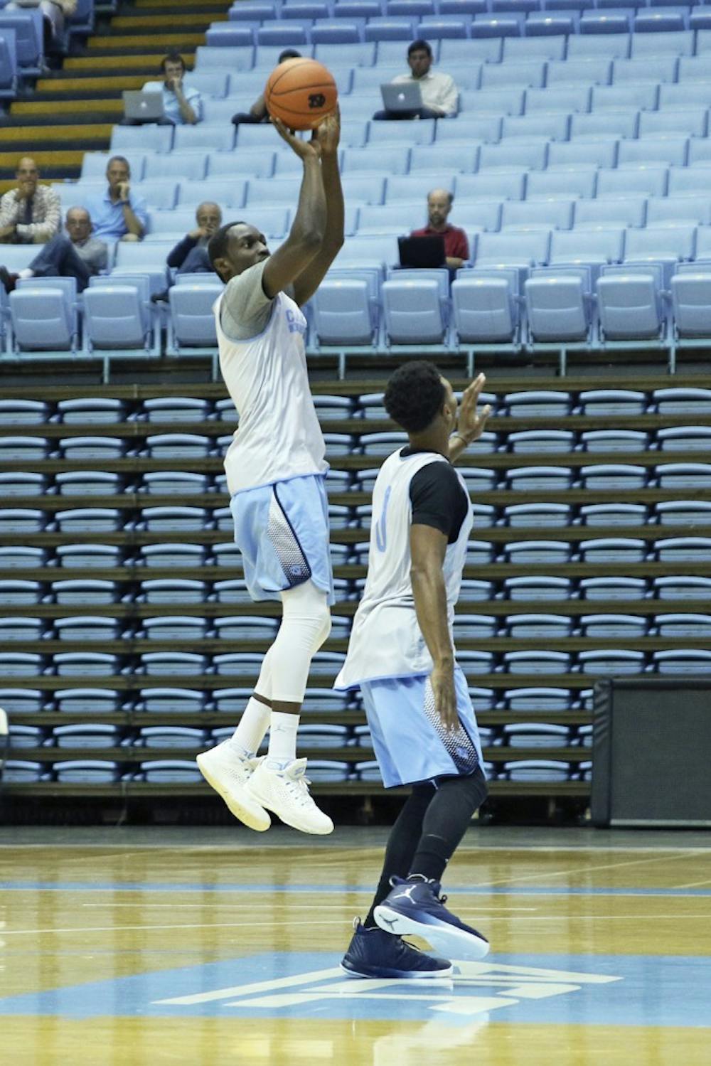 UNC forward Theo Pinson (1)&nbsp;pulls up for a shot over guard&nbsp;Nate Britt (0) during practice on&nbsp;UNC Media Day on October 11th. Pinson has since fractured his foot and is out indefinitely.&nbsp;
