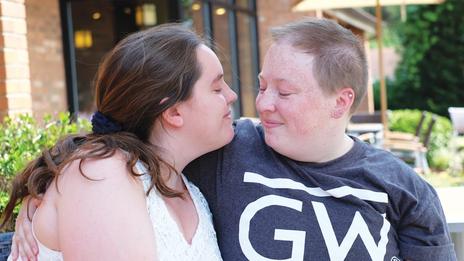 Danielle Martin (left) and Katy Folk pose in front of Caribou Coffee on June 30. Martin and Folk plan to get married in North Carolina in May 2016.