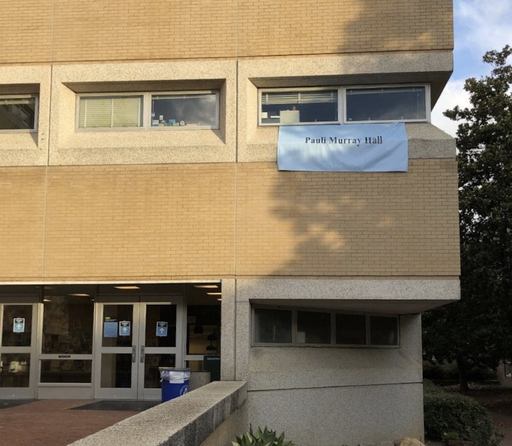 <p>A temporary banner hangs reading “Pauli Murray Hall” on the building originally named Hamilton Hall on Monday, July 13, 2020. Photo courtesy of Lisa Lindsay.</p>
