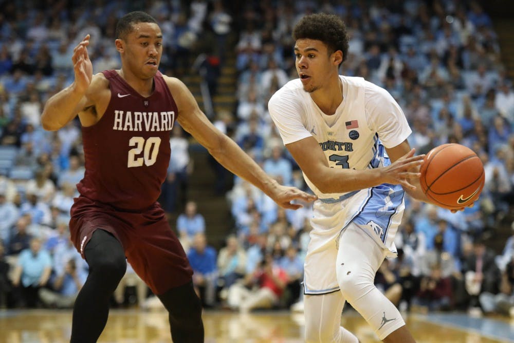 basketball vs Harvard Cam Johnson