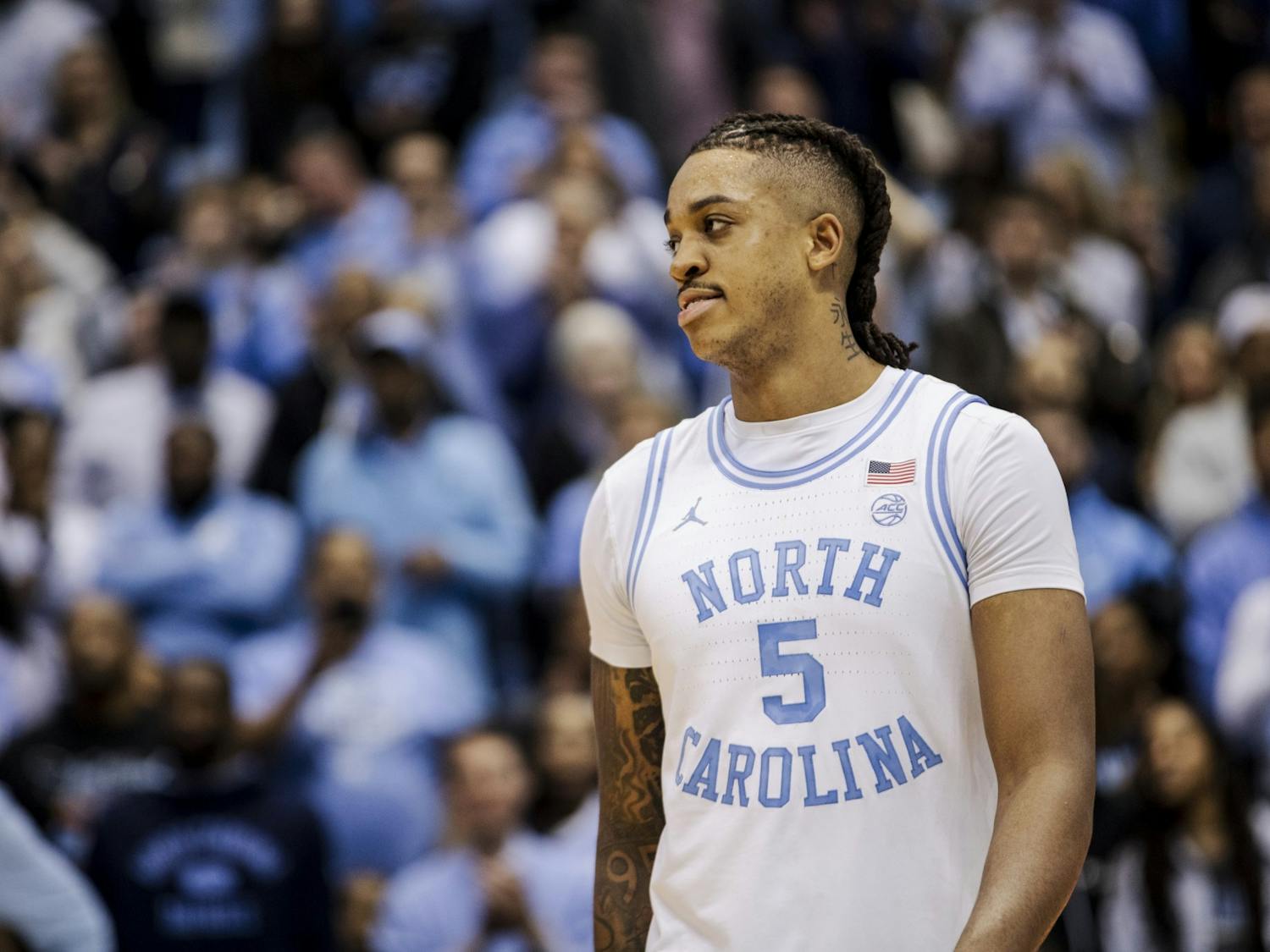 UNC senior forward Armando Bacot (5) walks off the court after setting a school record for most career double-doubles during a basketball game against N.C. State on Saturday, Jan. 21, 2023, in the Dean E. Smith Center. UNC won 80-69.