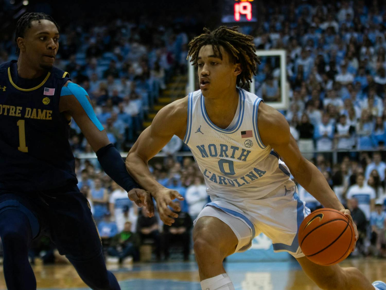 UNC freshman guard Seth Trimble (0) drives toward the basket in the game against Notre Dame in the Dean Smith Center on Jan. 7, 2023. UNC won 81-64.