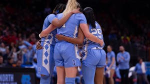 Members of the UNC women's basketball team huddle during the game against Ohio State in the second round of the NCAA Tournament at the Schottenstein Center in Columbus, Ohio on Monday, March 20, 2023.