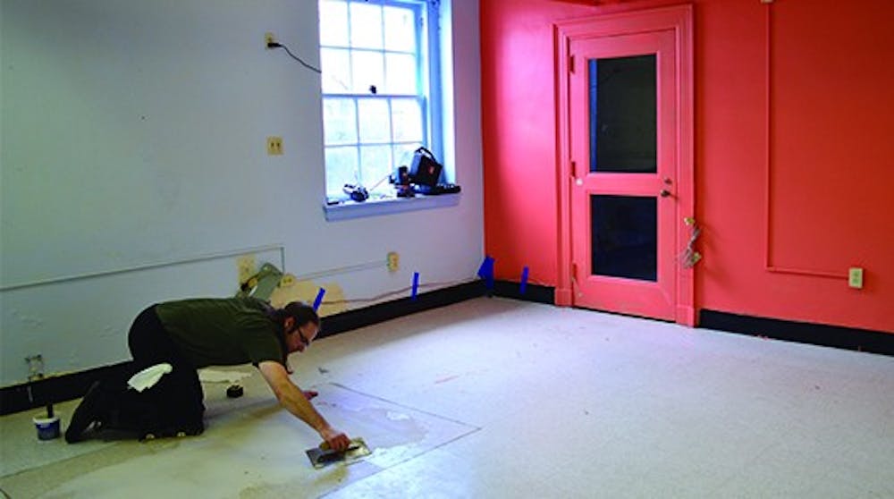 Al's Burger Shack
Beat Making Lab
Coffee Shop Greenbridge 

John Simonetti lays tile in the space that will become the Beat Making Lab across from the teen center on Franklin St. 
