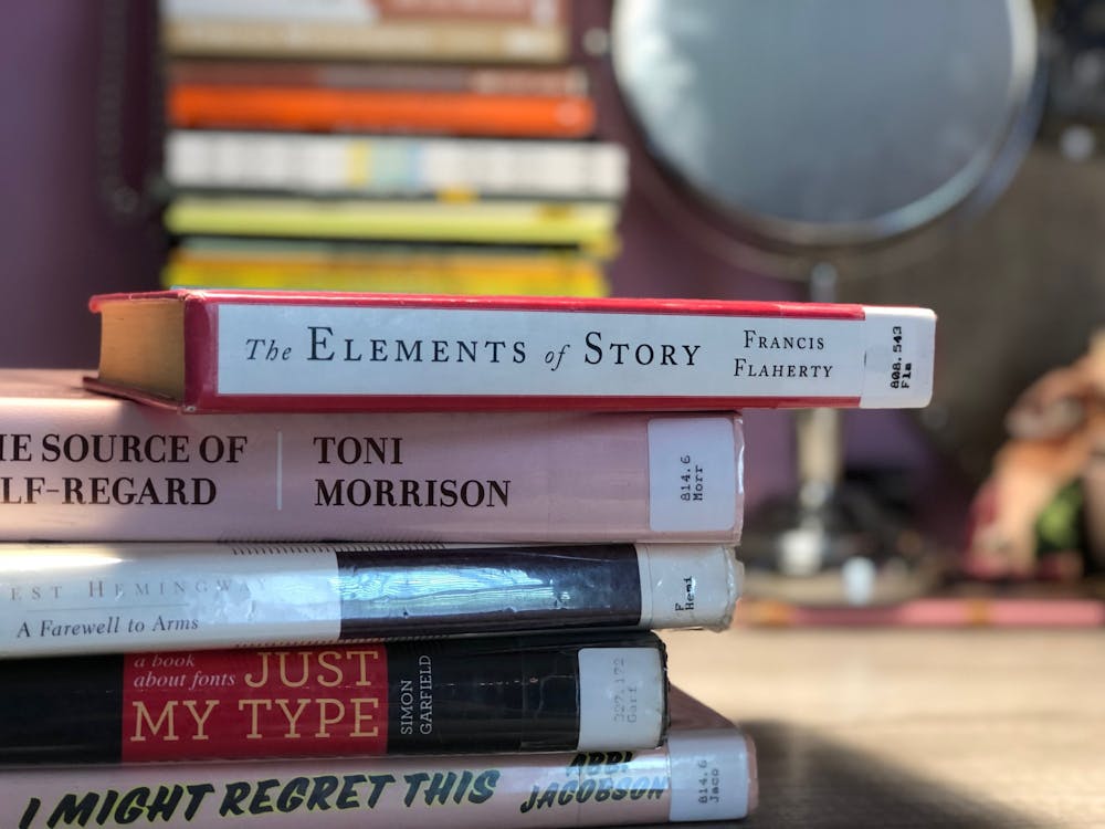 <p>A stack of books from the Chapel Hill Public Library on Thursday, May 14, 2020.&nbsp;</p>