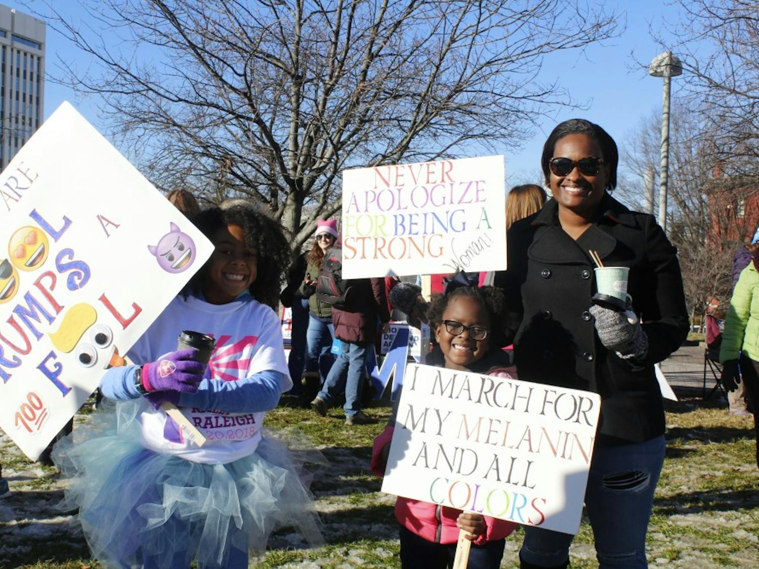 (From left) Kayla Dunson, Cheyloh Scott, and Jennifer Grayson from Fayettville, N.C. attended Saturday's march.