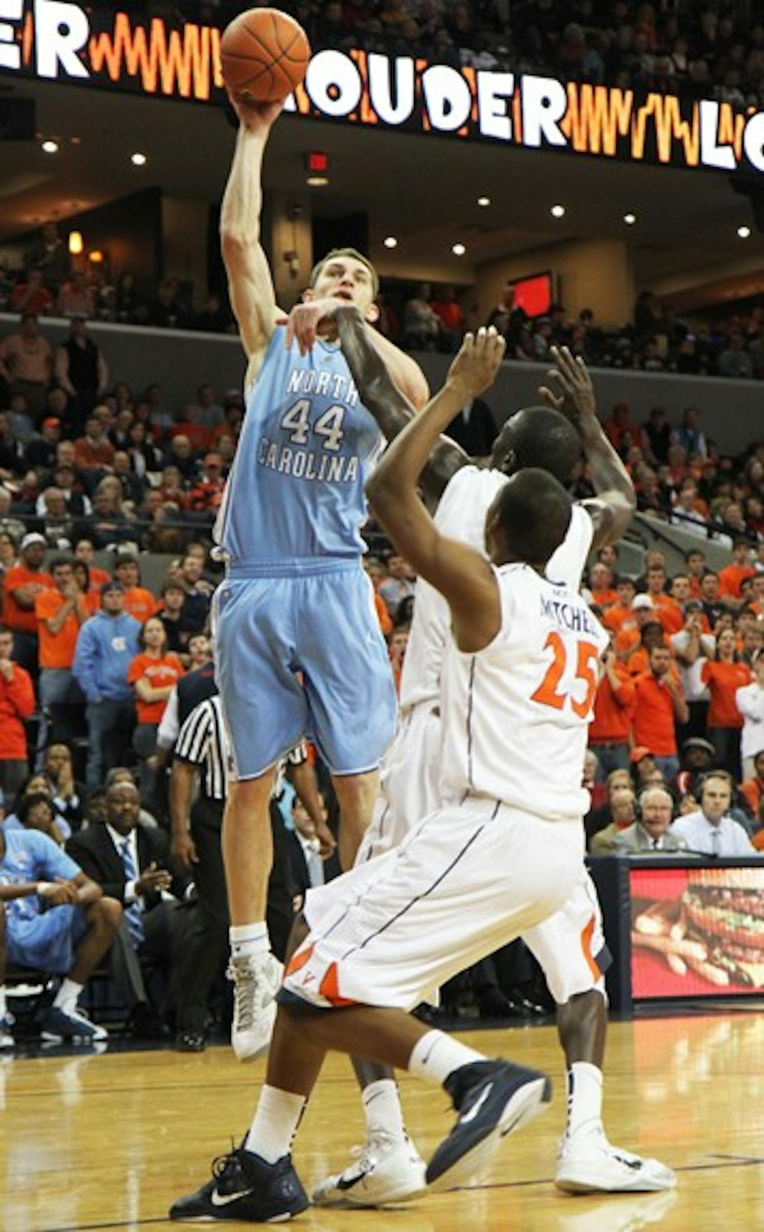 Tyler Zeller goes up for a close-range shot at UVa. His four clutch free throws tied the game late in the second half.