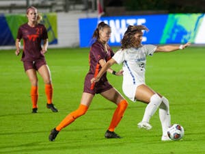 UNC sophomore forward Isabel Cox (13) kicks the ball at ACC tournament game against Virginia Tech on Tuesday, Nov. 10, 2020 at the WakeMed Soccer Park. The Tar Heels beat the Hokies 1-0.
