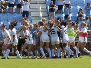 UNC women's soccer team celebrates their win against Stanford on Sept. 5. UNC beat Stanford in overtime 2-1.