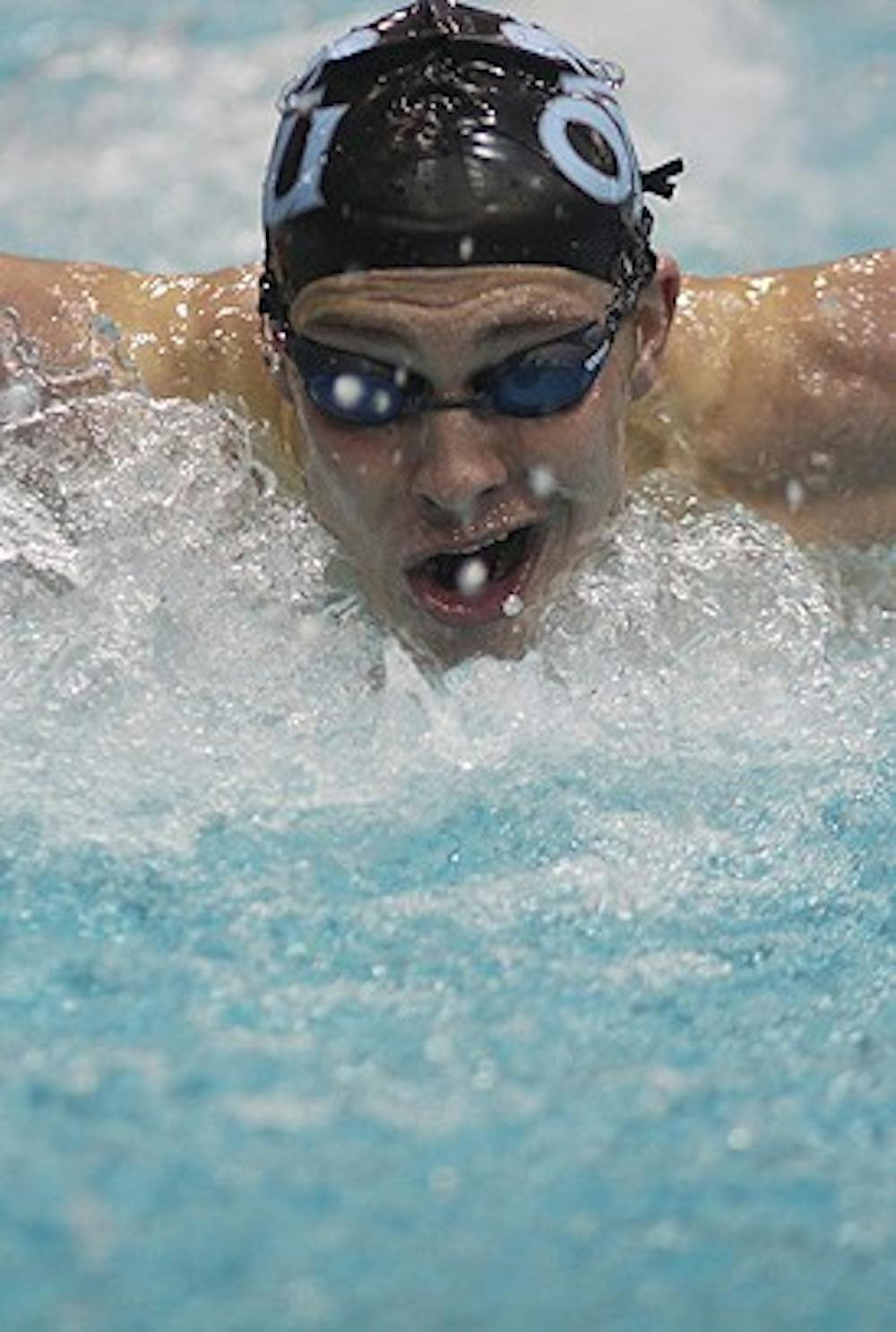 Swimming and Diving!!! These are from finals Saturday 6pm. Tyler Hill, UNC, Butterfly 200 yard