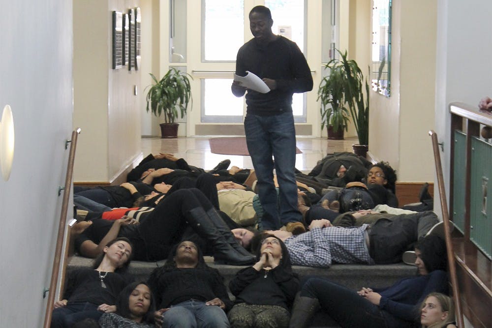 Joseph Bishop leads fellow law school students in a die-in to protest racial bias.