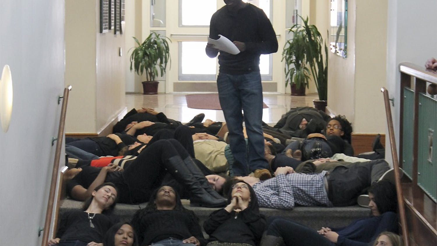 Joseph Bishop leads fellow law school students in a die-in to protest racial bias.