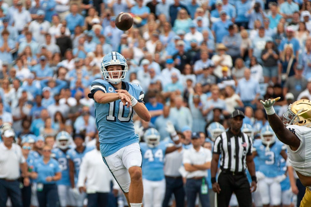 <p>Quarterback Drake Maye (10), throws a touchdown in Kenen Stadium on Sept. 24, 2022, at the UNC game against Notre Dame. Notre Dame defeated the Tar Hesls, 45-32.</p>