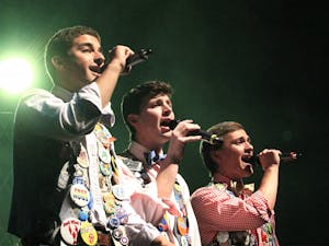 Jeff Popkin, Jason Hill, and Miles Herr (from left to right), members of the oldest A Capella group at UNC Chapel Hill, The Clef Hangers, perform their Fall Concert in Memorial Theater. 