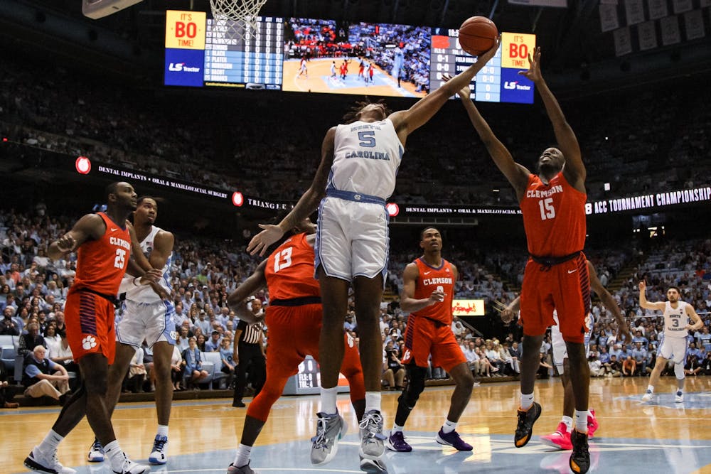 UNC's freshman forward Armando Bacot (5) attempts to gain possession of the ball during a game against Clemson at the Dean Smith Center on Saturday, Jan. 11th, 2020. Clemson defeated UNC for the first time in Chapel Hill 79-76.