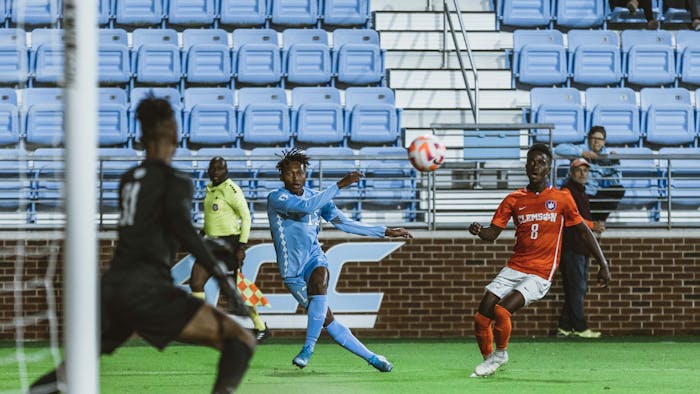 UNC freshman Key White (13) attempts to score in first half of the men's soccer match against Clemson on Monday, Oct. 3, 2022, at Dorrance Field. Clemson defeated UNC 1-0.