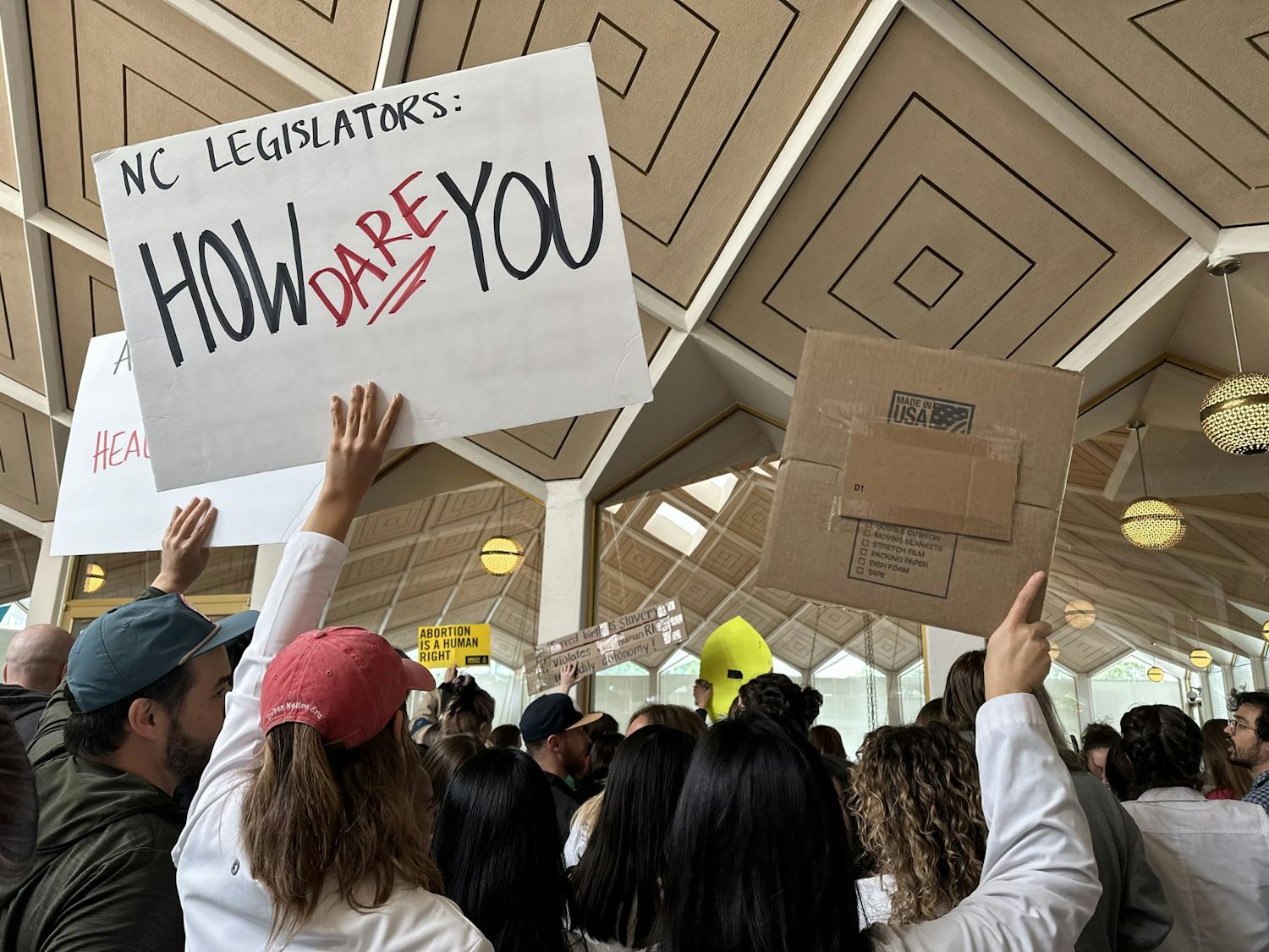 Protesters gather on the third floor of the Legislative Building on May 3, 2023, to protest a new anti-abortion bill introduced in the N.C. General Assembly.