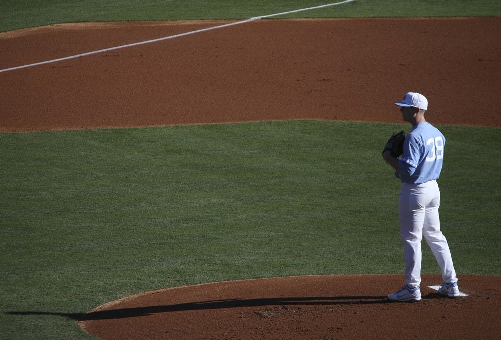 <p>North Carolina pitcher J.B. Bukaukas (38) prepares to throw out the season opening pitch against Kentucky on February 17.</p>