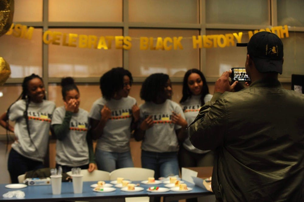 Members of the Black Student Movement celebrate the beginning of Black History Month in the Student Union on Friday, Feb. 1, 2019.