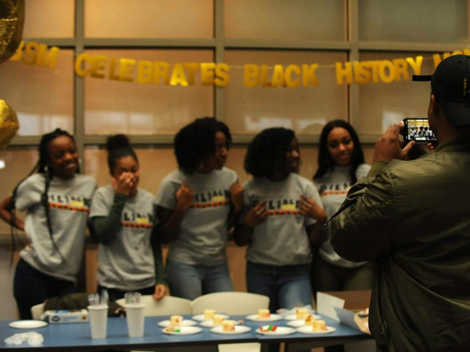 Members of the Black Student Movement celebrate the beginning of Black History Month in the Student Union on Friday, Feb. 1, 2019.