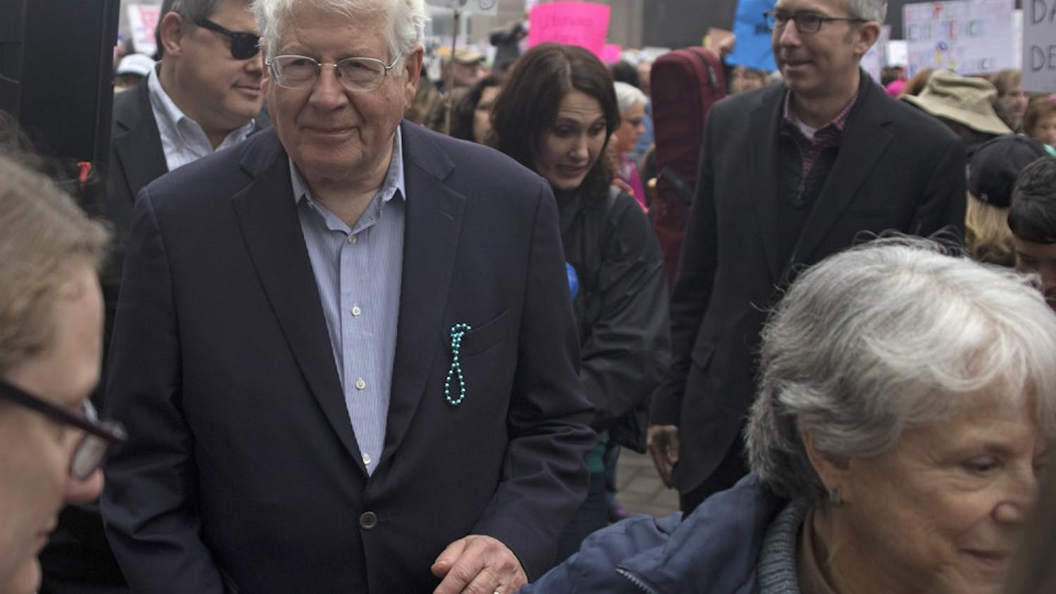 North Carolina Congressman David Price marches with protestors as they make their way through Raleigh during the 2016 Women's March in protest of the inauguration of Donald Trump as the 45th president of the United States.