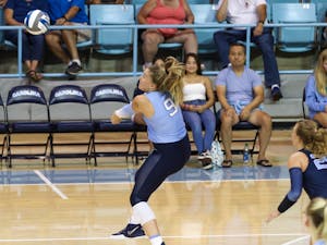 Sophomore outside hitter Mabrey Shaffmaster (9) goes to bump the ball over the net. UNC beat Arizona 3-2 at home on Saturday, Sept. 3, 2022.