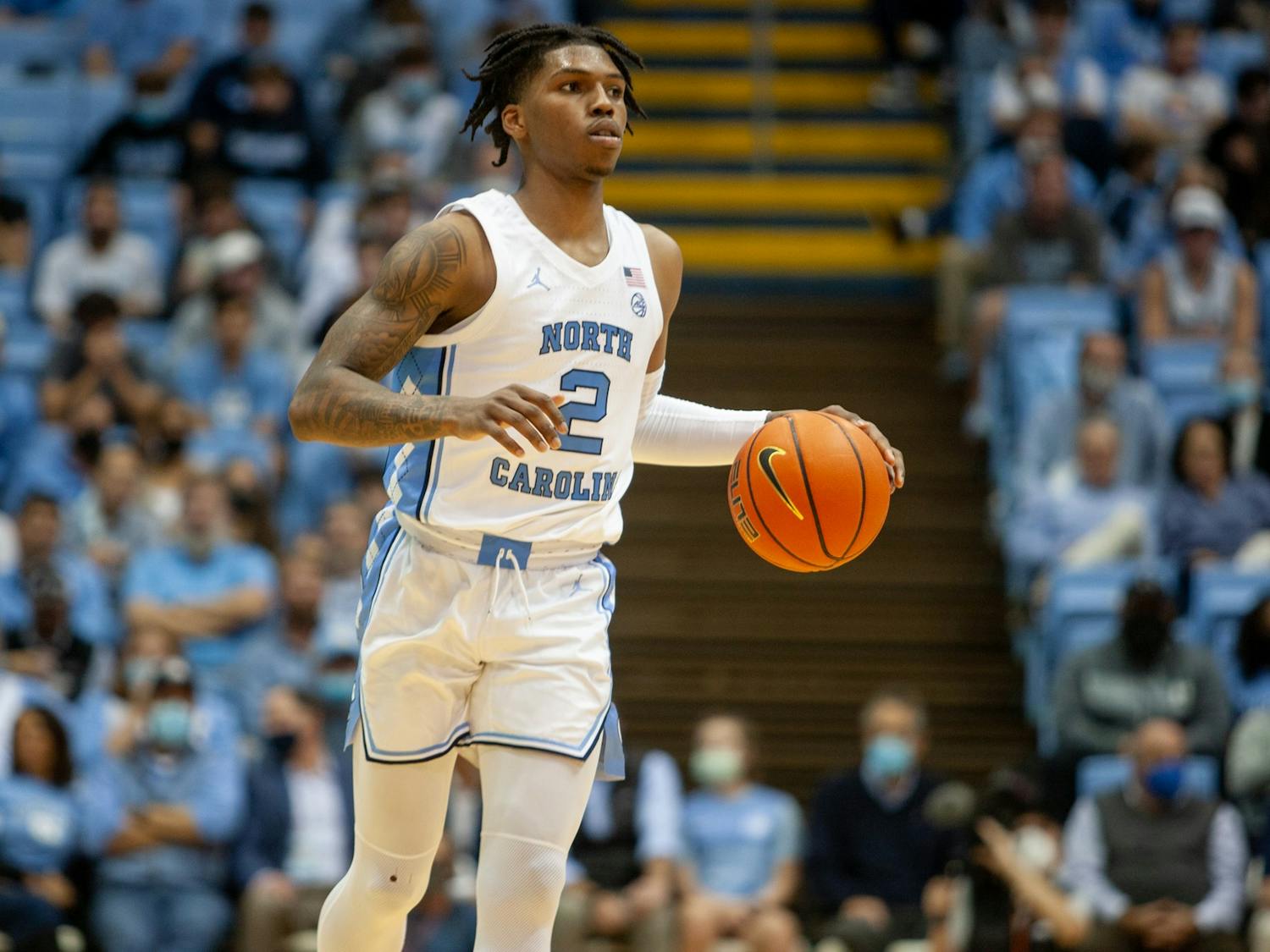 UNC sophomore guard Caleb Love (2) opens a play during the Tar Heels' game in the Smith Center on Nov. 9 against the Loyola Ramblers. UNC won 83-67.