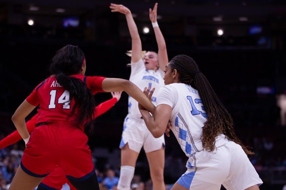 UNC redshirt first-year guard/forward Teonni Key (13) guarding an opponent during UNC’s NCAA Tournament first-round game against the St. John’s Red Storm in the Schottenstein Center in Columbus, Ohio on Saturday, March 18, 2023. The Tar Heels won 61-59.