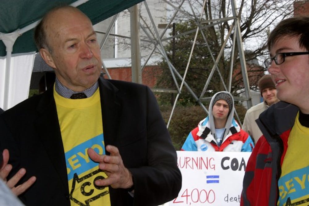 James Hansen, a leading climatologist and a professor at Columbia University, speaks in front of UNC’s  cogeneration facility.
