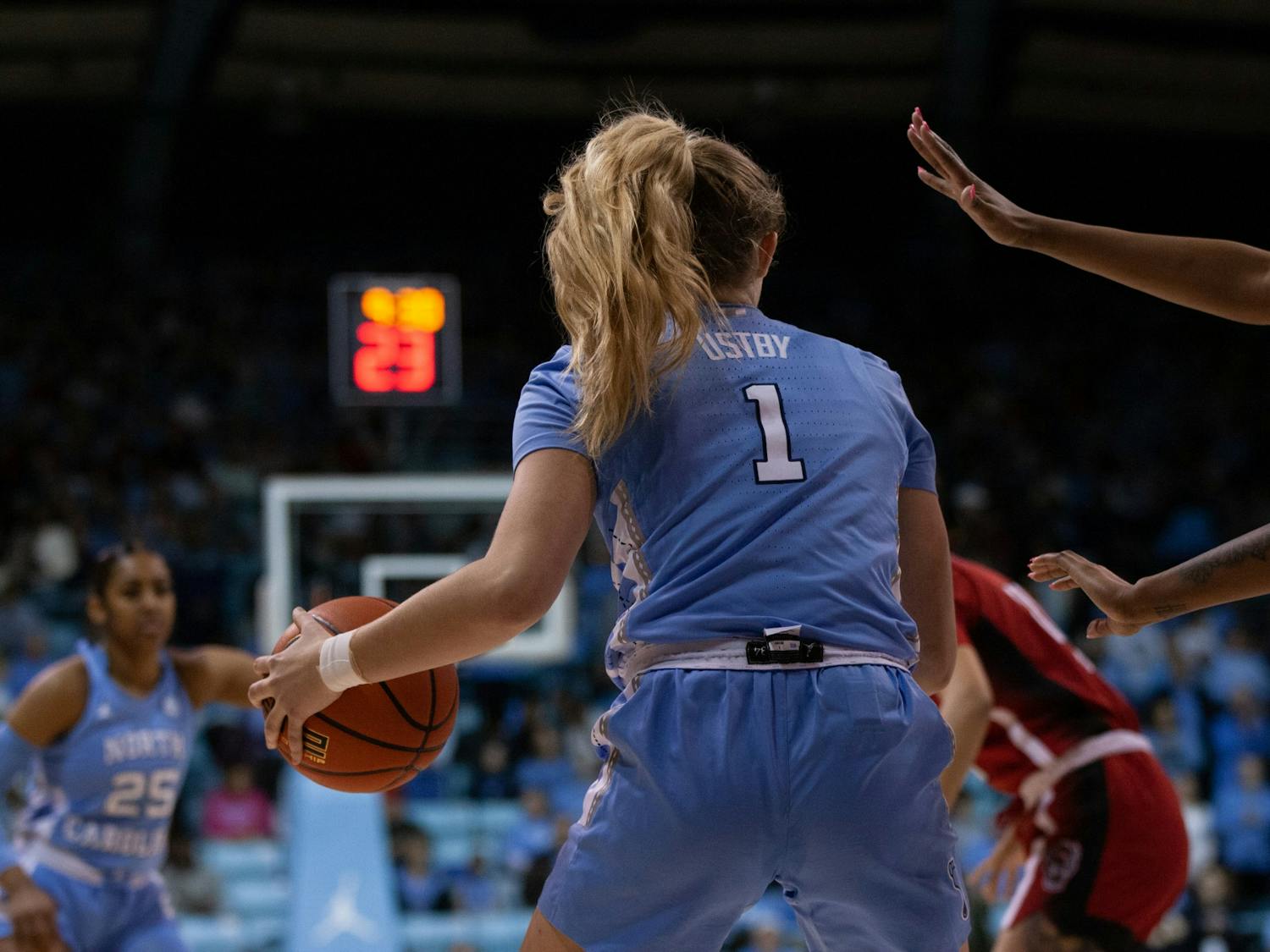 UNC junior guard/forward Alyssa Ustby (1) dribbling the ball during the women's basketball game against the NC State Wolfpack in Carmichael Arena on Sunday, Jan. 15, 2023. The Tar Heels won 56-47.