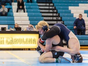 UNC's Clay Lautt lost the 165-pound bout against Pitt on Jan. 26 in Carmichael Arena.