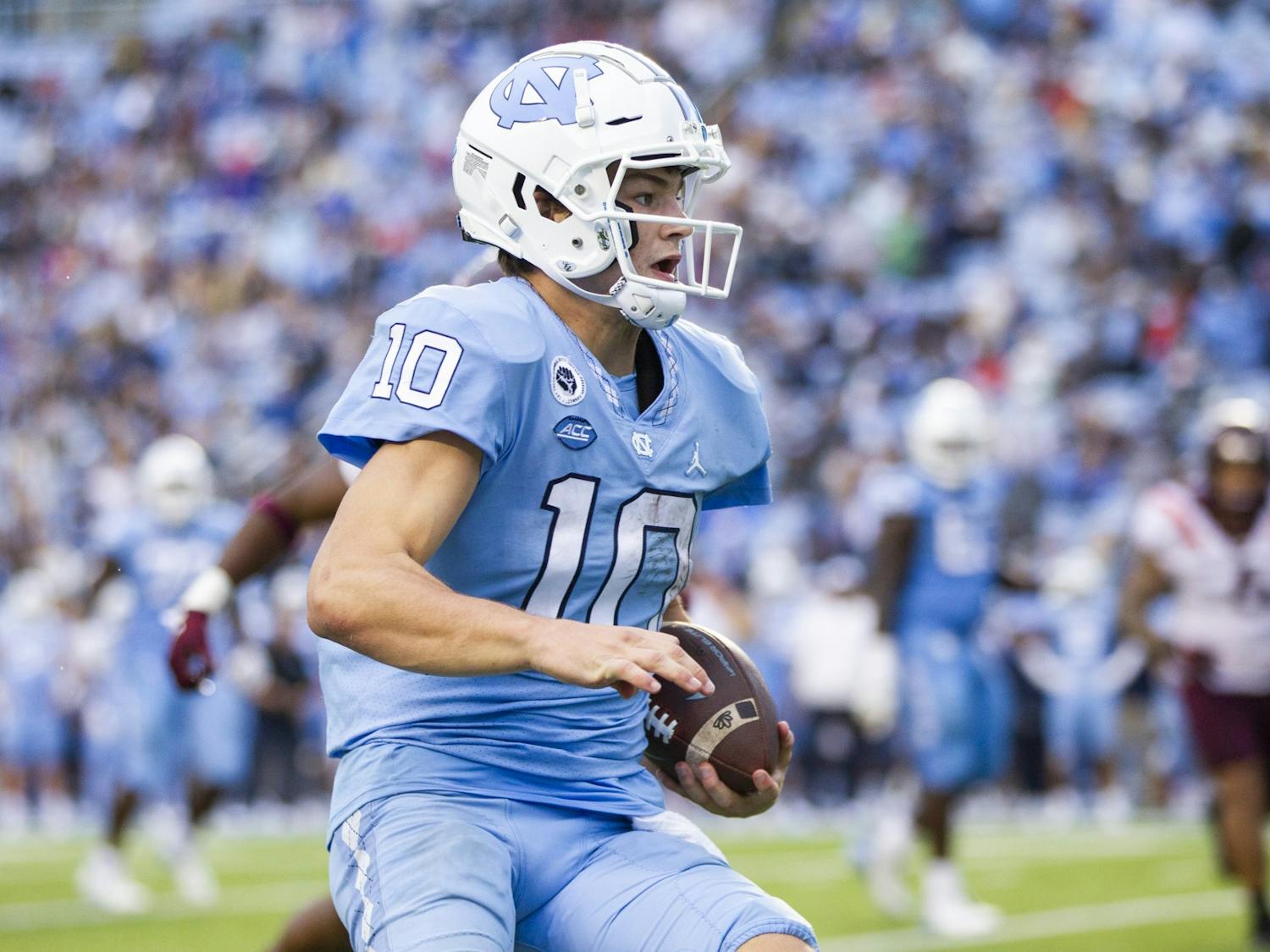 UNC first-year quarterback Drake Maye (10) seeks an open pass during a home football game at Kenan Stadium against Virginia Tech on Saturday, Oct. 1, 2022. UNC won 41-10.