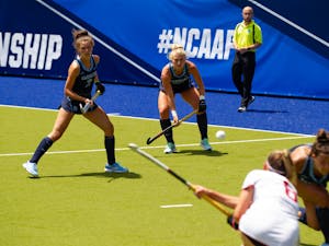 UNC redshirt Junior back Cassie Sumfest and Junior forward Hannah Griggs prepare to defend against a flick made by Stanford. No. 1 seed Carolina FIeld Hockey defeated the Cardinals in a 2-0 victory, advancing them to the next round of the NCAA D1 Field Hockey Championships.