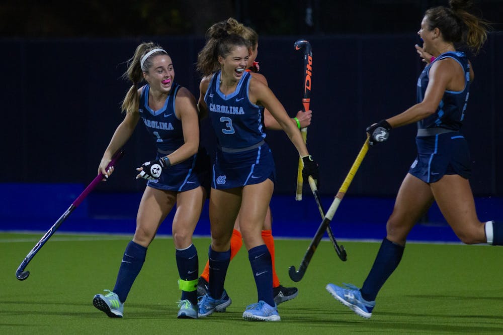 Members of the UNC Field Hockey team celebrate after junior forward Erin Matson (1) scores the second goal of the game against Syracuse. The Tar Heels won the ACC Semifinals with a 4-3 score on Friday, Nov. 6, 2020.